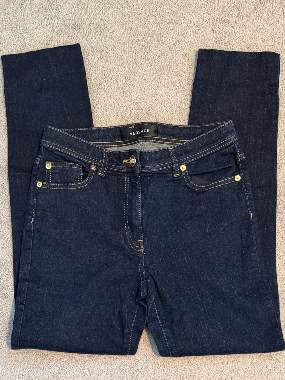Versace mid rise dark wash skinny jeans